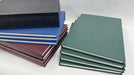 Fifteen case-bound A4 sketchbooks